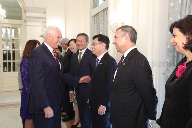 Taken at: Official Welcome Ceremony for US Vice-President Mike Pence at Istana. Pictured: US Vice-President Mike Pence, Minister for Defence Dr Ng Eng Hen's wife Dr Ivy Lim Swee Lian (fifth from right), Minister for Foreign Affairs Dr Vivian Balakrishnan (fourth from right) and Minister for Finance Heng Swee Keat (third from right).