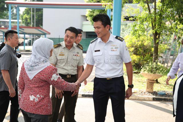 Taken at: Visit to National Day Parade (NDP) 2019 Parade and Ceremony (P and C) Drum Call training at APSN (Association for Persons with Special Needs) Tanglin School Pictured: President Halimah Yacob, Chairman of the NDP 2019 Executive Committee Brigadier-General Yew Chee Leung and Chairman for NDP 2019 P and C Senior Lieutenant Colonel Loh Woon Liang