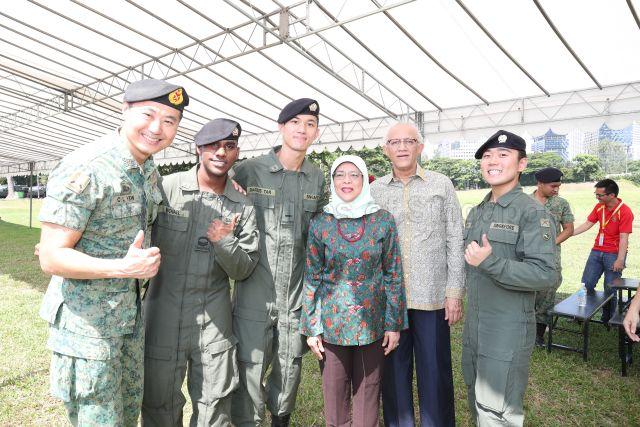Taken at: President Halimah Yacob's visit to National Day Parade (NDP) Mobile Column (MC) Rehearsal at the MC Holding Area at Republic Ave Pictured: President Halimah Yacob, her husband Mohamed Abdullah Alhabshee and Chairman of the NDP 2019 Executive Committee Brigadier-General (BG) Yew Chee Leung