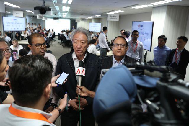 Taken at: Exercise Cyber Star 2019 conducted by Cyber Security Agency (CSA) at MND Building Pictured: Senior Minister and Coordinating Minister for National Security Teo Chee Hean, Minister for Communications and Information and Minister-in-Charge of Cybersecurity S Iswaran and Senior Minister of State for Communications and Information and Senior Minister of State in-charge of Cybersecurity Dr Janil Puthucheary