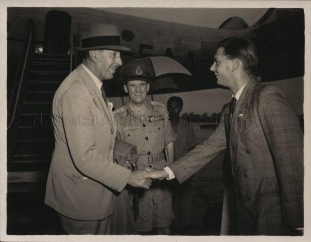 Lieu-General Sir Harold Briggs, the newly appointed Director of Operations in the Federation (left) pictured on his arrival at Kallang from London being introduced to the Private Secretary to the Governor, Mr M Gorrie. In the centre is the C-in-C Far East Land Forces, General Sir John Harding.