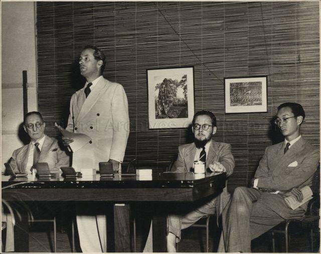 Sir Roland Braddell, HE The Commissioner General. Dr Gibson-Hill, Mr Loke Wan Tho at the opening of the Photographic Exhibition