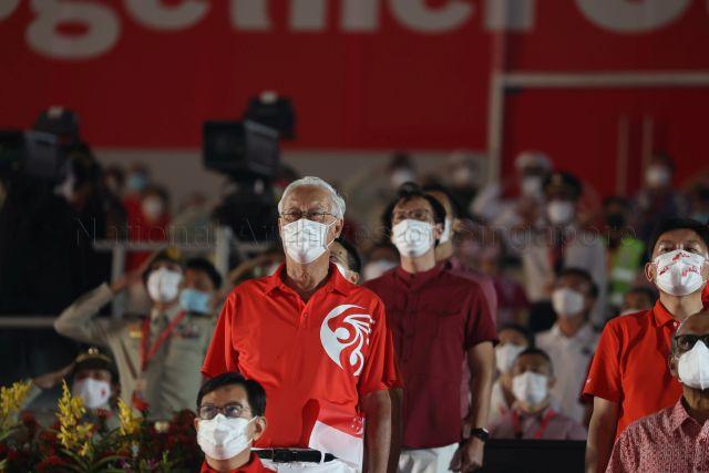Taken at: National Day Parade (NDP) 2021 ceremonial parade at The Float @ Marina Bay Pictured: Deputy Prime Minister and Coordinating Minister for Economic Policies Heng Swee Keat, Emeritus Senior Minister Goh Chok Tong, Senior Minister and Coordinating Minister for Social Policies Tharman Shanmugaratnam (partially hidden) and Senior Minister for Transport Chee Hong Tat