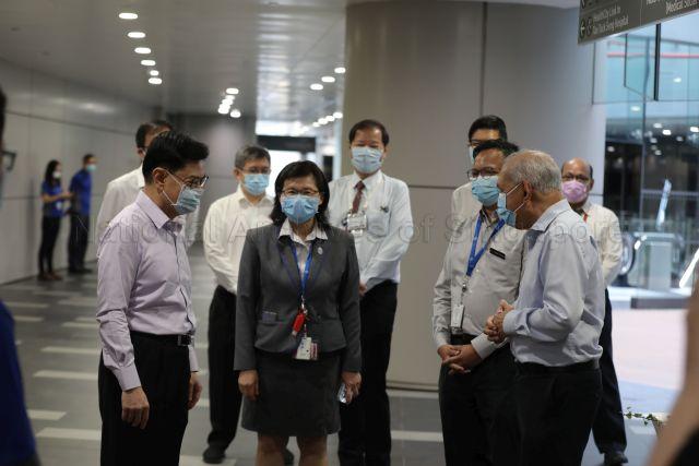 Taken at: National Centre for Infectious Diseases (NCID)'s second anniversary celebration and launch of the NCID Gallery at NCID Pictured: Guest-of-Honour Deputy Prime Minister and Coordinating Minister for Economic Policies Heng Swee Keat, Director of Medical Services of the Ministry of Health Associate Professor Kenneth Mak, Group CEO of National Healthcare Group Professor Philip Choo and Executive Director of NCID Professor Leo Yee Sin