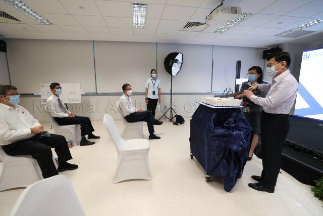 Taken at: National Centre for Infectious Diseases (NCID)'s second anniversary celebration and launch of the NCID Gallery at NCID Pictured: Guest-of-Honour Deputy Prime Minister and Coordinating Minister for Economic Policies Heng Swee Keat, Chairman of National Healthcare Group Board Tan Tee How, Chief Health Scientist Professor Tan Chorh Chuan and Executive Director of NCID Professor Leo Yee Sin