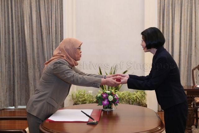 Taken at: Swearing In Ceremony of Second Permanent Secretary for Smart Nation and Digital Government Group and Communications and Information Chng Kai Fong, Second Permanent Secretary for Ministry of National Development Teoh Zsin Woon and Second Permanent Secretary for Education and Social and Family Development Lim Wan Yong at the Istana Pictured: President Halimah Yacob and Second Permanent Secretary for Ministry of National Development Teoh Zsin Woon
