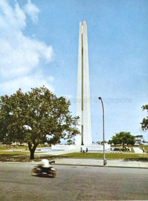 Photograph of the Civilian War memorial, a monument dedicated to civilians who perished during the Japanese Occupation of Singapore (1942-45). It is located on a parkland, along Beach Road, opposite Raffles City. The memorial was officially unveiled by Prime Minister Lee Kuan Yew on 15 February 1967.