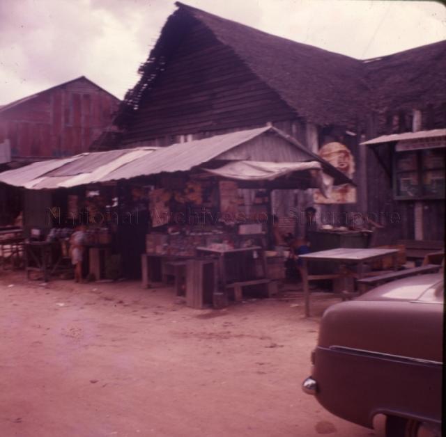 Photograph of shop with attap roof in Jalan Kayu