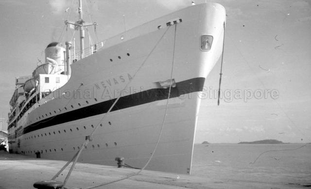 Photograph of HMT Nevasa docked in Singapore