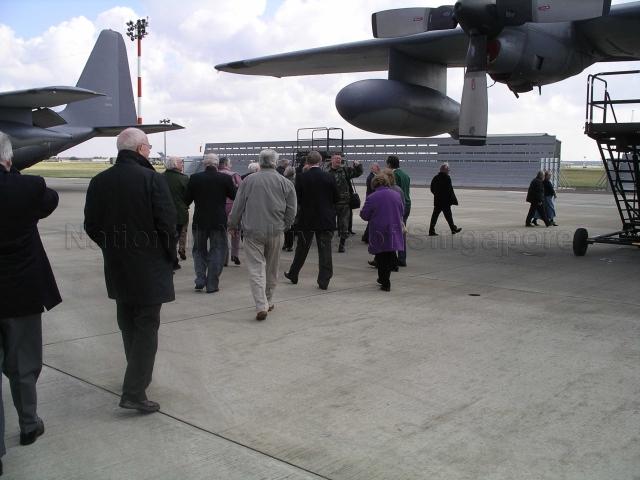 Photograph of Royal Air Force Seletar Association (RAFSA) members looking at Lockheed MC-130, at RAF Mildenhall, U.K.