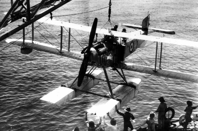 Photograph of recovery of Gerry Livock's Fairey IIID aboard HMS Pegasus after a survey flight over the Seletar area in 1924