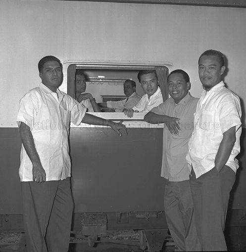 The person on the far right is Hussein Jahidin.