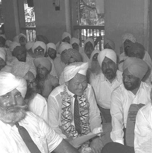 The person on his left smiling with him is Prem Singh's dad, Kirpal Singh, who graduated top of his law cohort in 1963 University of Singapore as a part-time student, besting the full-timers.