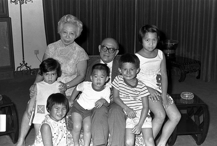 Mr and Mrs Tan Chin Tuan. Also present are their grand children. Grand children from left to right are Helene Campbell, Chew Gek Hiang, Chew Kwee San, Chuan Campbell and Chew Gek Khim.