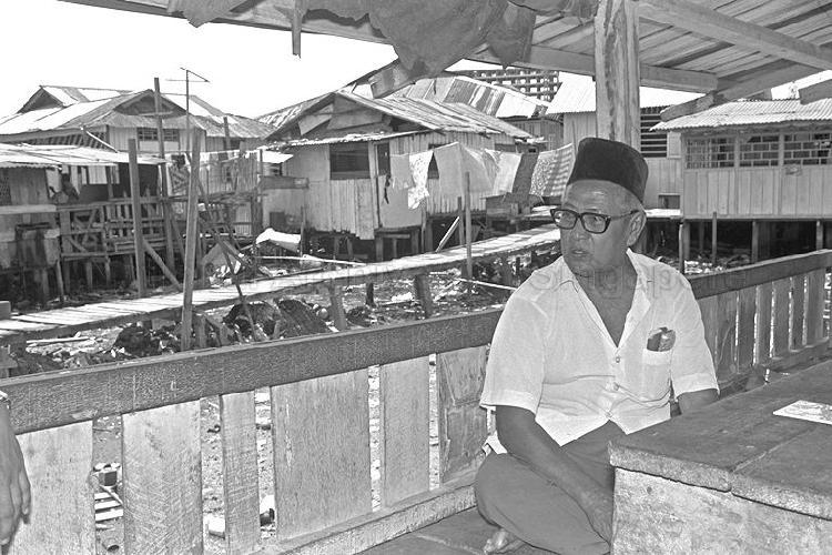 Encik Mohamad Ismail at the village of Kampong Kuchai Lorong 3, which will be demolished to give way for urban redevelopment