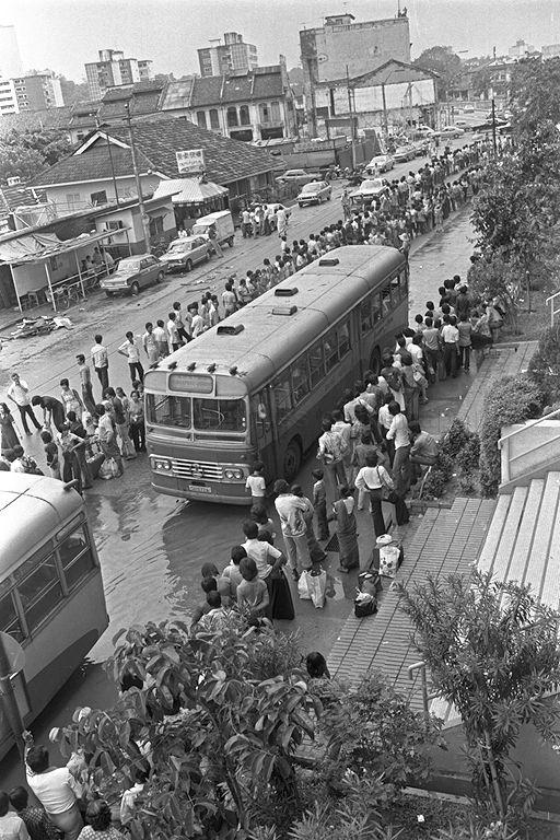 Commuters queueing for the Singapore-Johore Express bus to Johore Bahru at Queen Street. 