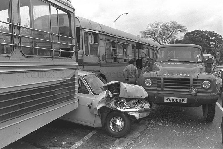 A serious road accident involving 2 Singapore Bus Services (SBS) buses, a Ford Escot driven by Ms. Lee Hee Chuan a nurse, a lorry and a van.  Ms. Lee was very fortunate to escape this horrific accident.